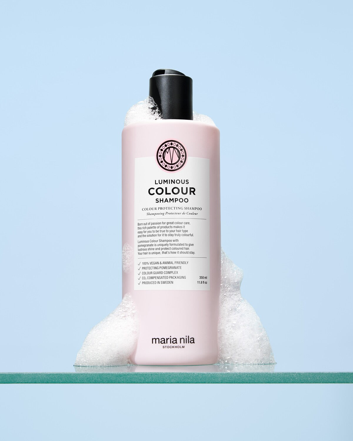 Maria Nila Luminous Colour Shampoo 350 ml geopende fles met textuur