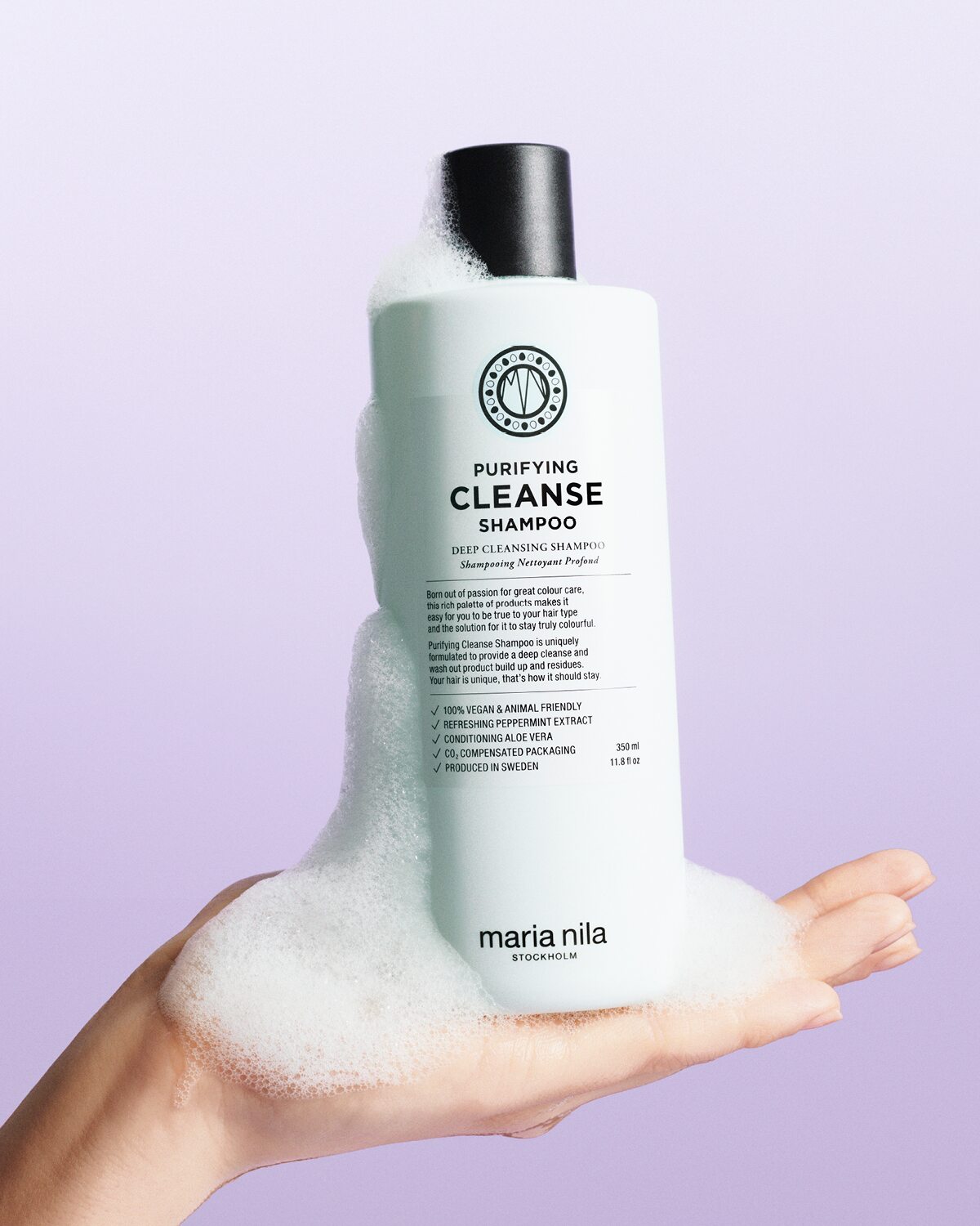 Maria Nila Purifying Cleanse Shampoo 350 ml geopende fles met textuur